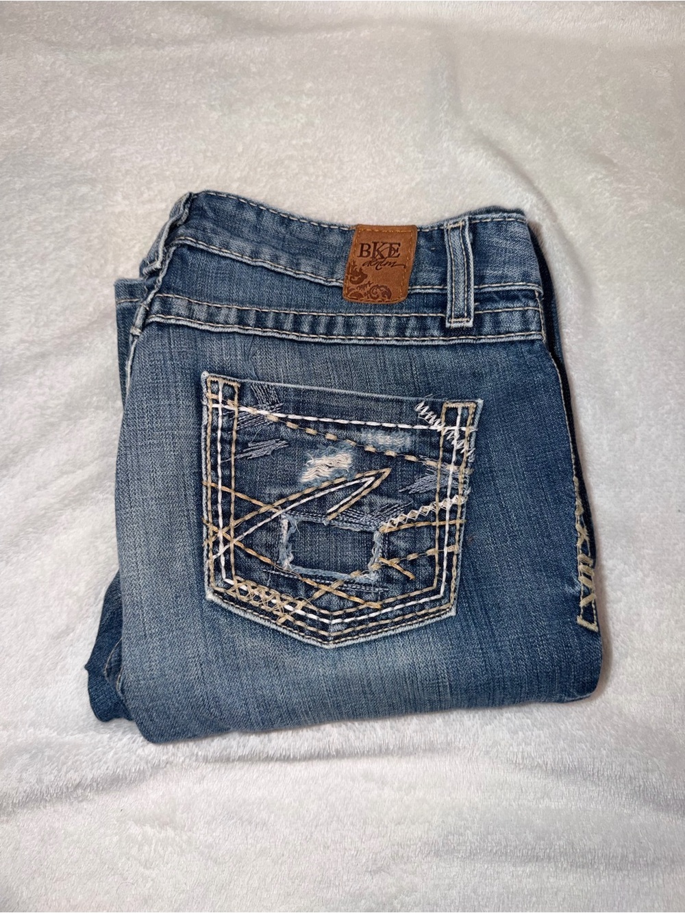BKE Women’s Blue Distressed Bootcut Jeans